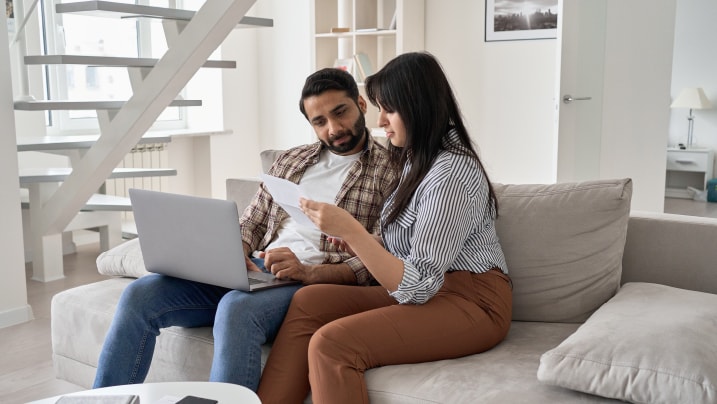 Person using laptop applying for a personal loan